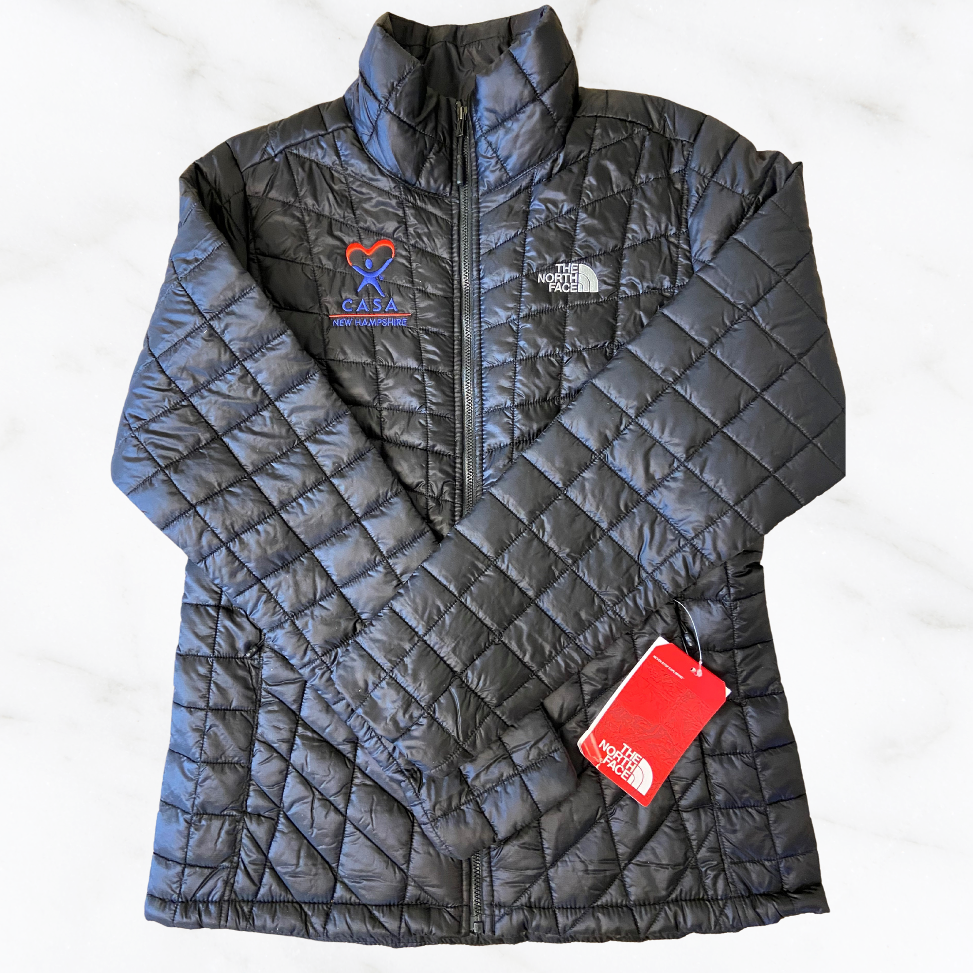 The North Face® Puffer Jacket - CASA of New Hampshire